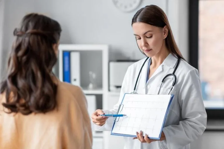 Physician reviewing cardiac diagnostic imaging on a monitor