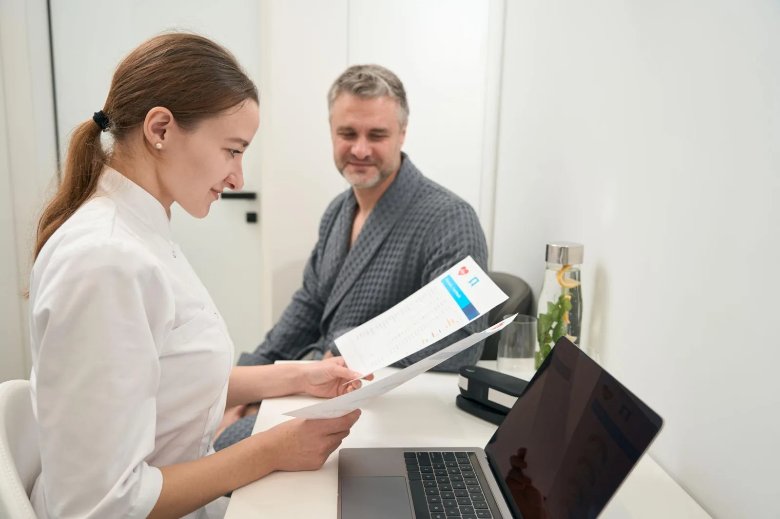 Physician reviewing diagnostic imaging on a monitor in a U.S. clinical setting